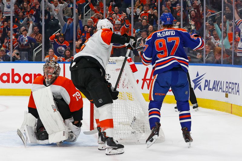 Jan 2, 2024; Edmonton, Alberta, CAN; Edmonton Oilers forward Connor McDavid (97) celebrates after scoring a goal against the Philadelphia Flyers goaltender Carter Hart (79) during the first period at Rogers Place. Mandatory Credit: Perry Nelson-USA TODAY Sports