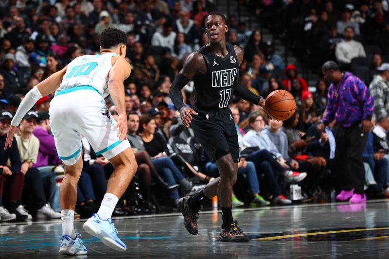 BROOKLYN, NY - NOVEMBER 19: Dennis Schroder #17 of the Brooklyn Nets dribbles the ball during the game against the Charlotte Hornets during an Emirates NBA Cup game on November 19, 2024 at Barclays Center in Brooklyn, New York. NOTE TO USER: User expressly acknowledges and agrees that, by downloading and or using this Photograph, user is consenting to the terms and conditions of the Getty Images License Agreement. Mandatory Copyright Notice: Copyright 2024 NBAE (Photo by David L. Nemec/NBAE via Getty Images)