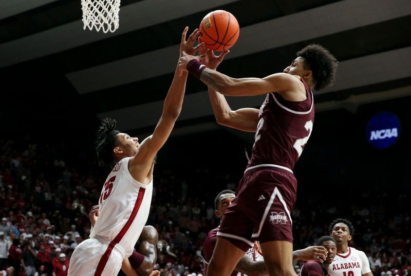 Feb 3, 2024; Tuscaloosa, Alabama, USA; Alabama forward Jarin Stevenson (15) tries to batt a rebound away from Mississippi State forward Jaquan Scott (22) at Coleman Coliseum. Mandatory Credit: Gary Cosby Jr.-USA TODAY Sports