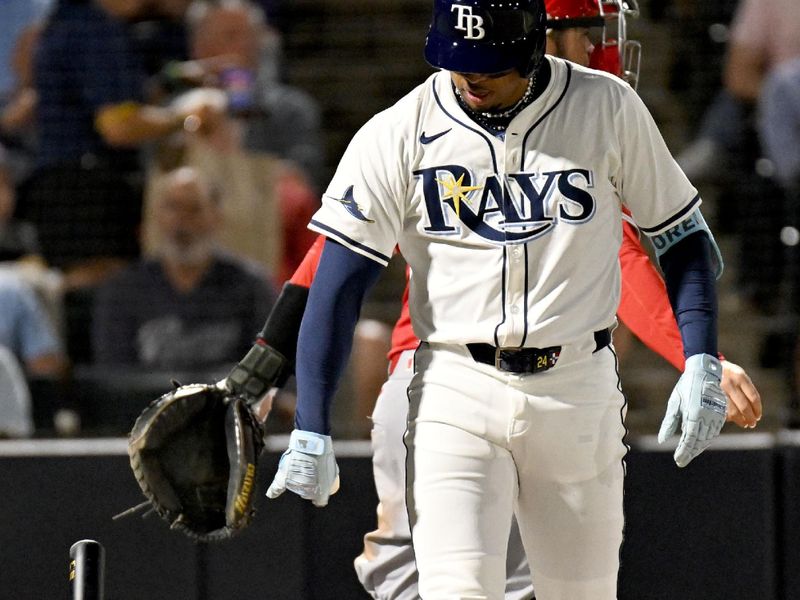 Apr 8, 2025; Anaheim, California, USA;  Tampa Bay Rays left fielder Christopher Morel (24) throws his bat down after striking out in the fourth inning against the Los Angeles Angels at George M. Steinbrenner Field. Mandatory Credit: Jonathan Dyer-Imagn Images