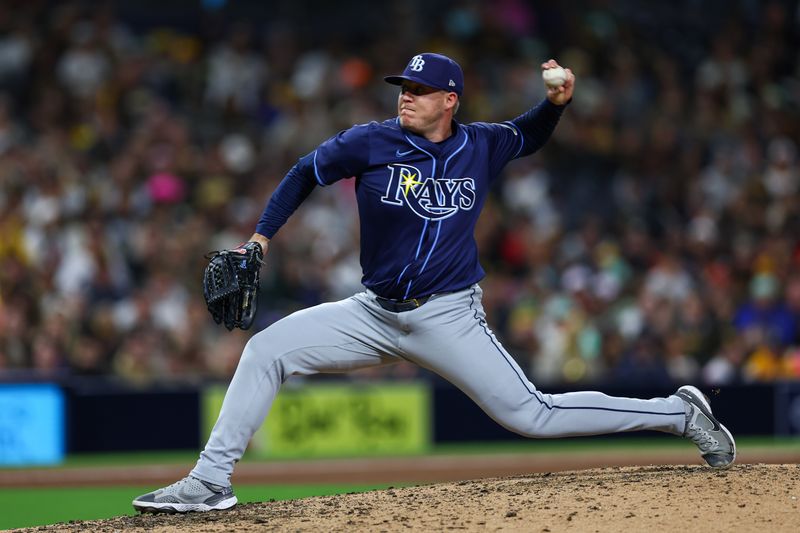 Apr 25, 2025; San Diego, California, USA; Tampa Bay Rays relief pitcher Garrett Cleavinger (60) pitches during the ninth inning against the San Diego Padres at Petco Park. Mandatory Credit: Chadd Cady-Imagn Images
