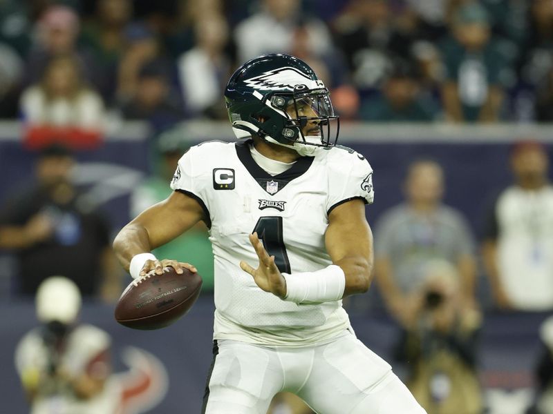 Philadelphia Eagles quarterback Jalen Hurts (1) looks to pass during an NFL Football game against the Houston Texans on Thursday, November 3, 2022, in Houston. (AP Photo/Matt Patterson)