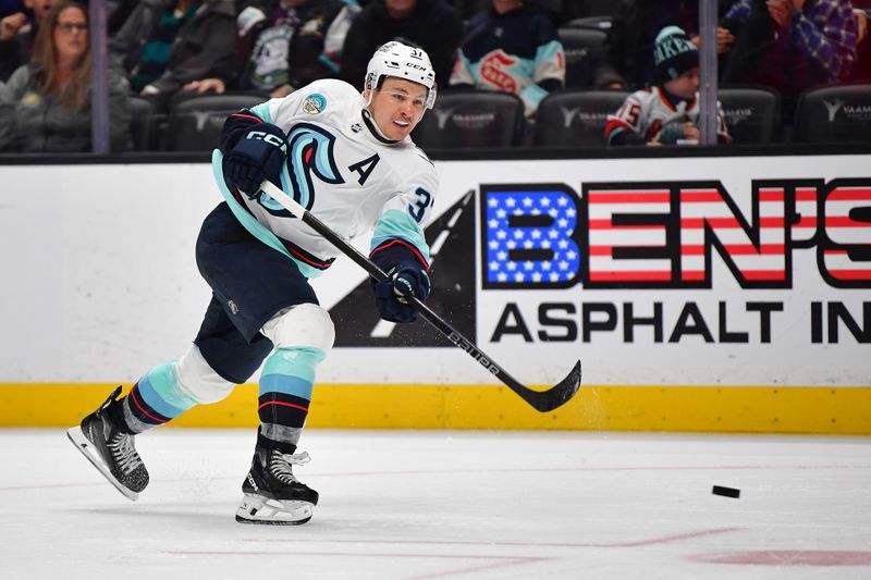 Apr 5, 2024; Anaheim, California, USA; Seattle Kraken defenseman Will Borgen (3) shoots on goal against the Anaheim Ducks during the third period at Honda Center. Mandatory Credit: Gary A. Vasquez-USA TODAY Sports