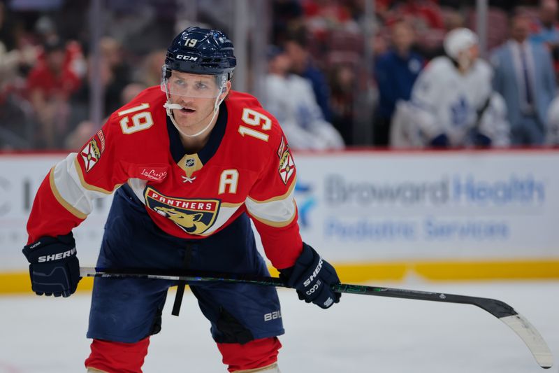 Nov 27, 2024; Sunrise, Florida, USA; Florida Panthers left wing Matthew Tkachuk (19) looks on against the Toronto Maple Leafs during the first period at Amerant Bank Arena. Mandatory Credit: Sam Navarro-Imagn Images