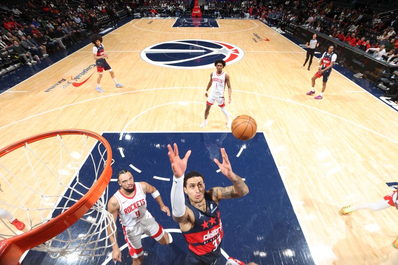 WASHINGTON, DC -? JANUARY 7:  Kyle Kuzma #33 of the Washington Wizards goes up for the rebound during the game on January 7, 2025 at Capital One Arena in Washington, DC. NOTE TO USER: User expressly acknowledges and agrees that, by downloading and or using this Photograph, user is consenting to the terms and conditions of the Getty Images License Agreement. Mandatory Copyright Notice: Copyright 2025 NBAE (Photo by Stephen Gosling/NBAE via Getty Images)