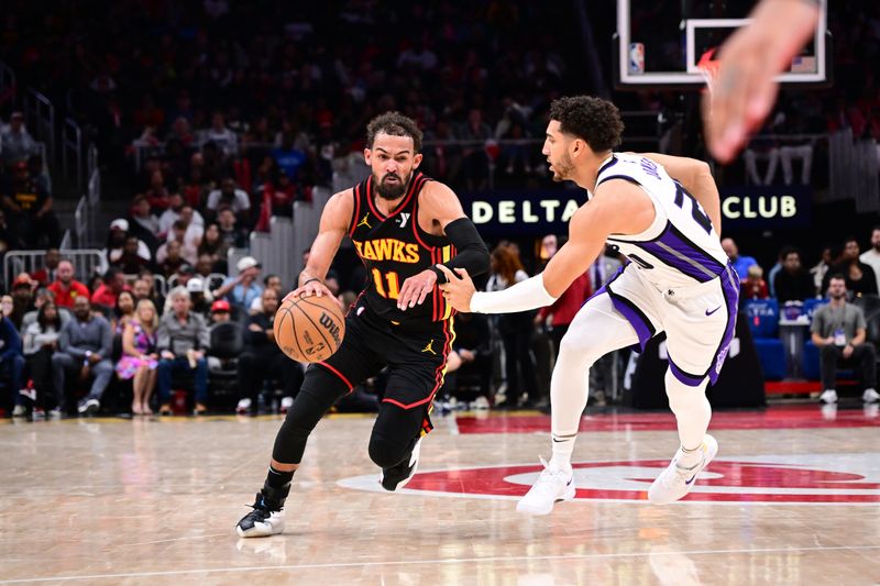 ATLANTA, GA - NOVEMBER 1: Trae Young #11 of the Atlanta Hawks handles the ball during the game against the Sacramento Kings on November 1, 2024 at State Farm Arena in Atlanta, Georgia.  NOTE TO USER: User expressly acknowledges and agrees that, by downloading and/or using this Photograph, user is consenting to the terms and conditions of the Getty Images License Agreement. Mandatory Copyright Notice: Copyright 2024 NBAE (Photo by Adam Hagy/NBAE via Getty Images)