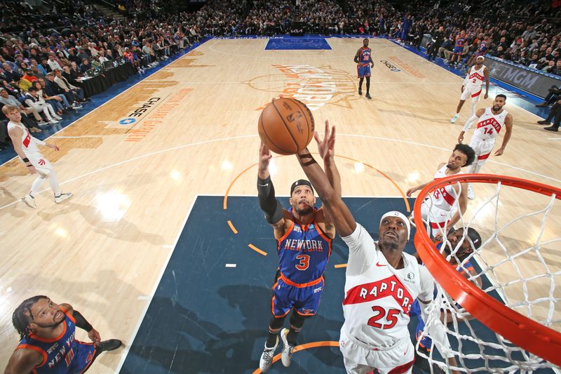 NEW YORK, NY - JANUARY 20: Chris Boucher #25 of the Toronto Raptors drives to the basket during the game against the New York Knicks on January 20, 2024 at Madison Square Garden in New York City, New York.  NOTE TO USER: User expressly acknowledges and agrees that, by downloading and or using this photograph, User is consenting to the terms and conditions of the Getty Images License Agreement. Mandatory Copyright Notice: Copyright 2024 NBAE  (Photo by Nathaniel S. Butler/NBAE via Getty Images)