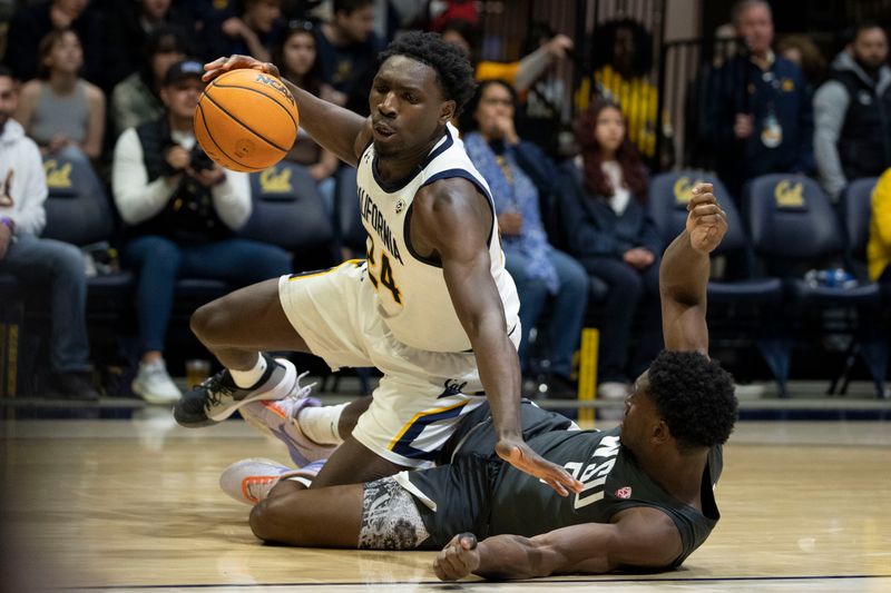 February 25, 2023; Berkeley, California, USA; Washington State Cougars guard Justin Powell (24) falls on top of Washington State Cougars guard TJ Bamba (5) during the second half at Haas Pavilion. Mandatory Credit: Kyle Terada-USA TODAY Sports