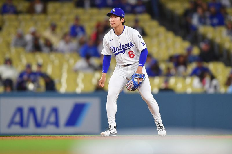 May 13, 2025; Los Angeles, California, USA; Los Angeles Dodgers second base Hyeseong Kim (6) in position against the Athletics during the ninth inning at Dodger Stadium. Mandatory Credit: Gary A. Vasquez-Imagn Images