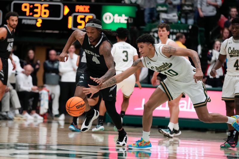 Feb 27, 2024; Fort Collins, Colorado, USA; Colorado State Rams guard Nique Clifford (10) steals a pass from Nevada Wolf Pack forward Tre Coleman (4) during the second half at Moby Arena. Mandatory Credit: Michael Madrid-USA TODAY Sports