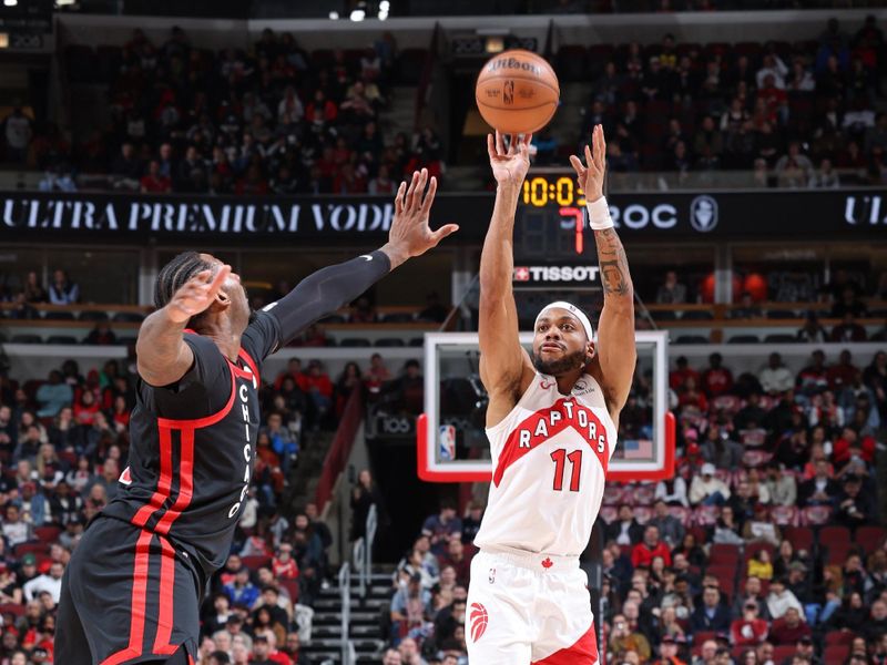 CHICAGO, IL - JANUARY 30: Bruce Brown #11 of the Toronto Raptors shoots a three point basket during the game against the Chicago Bulls on January 30, 2024 at United Center in Chicago, Illinois. NOTE TO USER: User expressly acknowledges and agrees that, by downloading and or using this photograph, User is consenting to the terms and conditions of the Getty Images License Agreement. Mandatory Copyright Notice: Copyright 2024 NBAE (Photo by Jeff Haynes/NBAE via Getty Images)