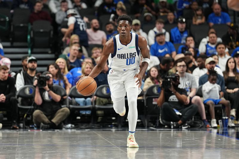 DALLAS, TX - OCTOBER 17: Jazian Gortman #00 of the Dallas Mavericks dribbles the ball during the game against the Milwaukee Bucks during a NBA preseason game on October 17, 2024 at American Airlines Center in Dallas, Texas. NOTE TO USER: User expressly acknowledges and agrees that, by downloading and or using this photograph, User is consenting to the terms and conditions of the Getty Images License Agreement. Mandatory Copyright Notice: Copyright 2024 NBAE (Photo by Glenn James/NBAE via Getty Images)