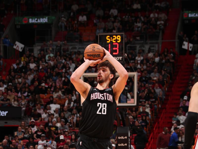 MIAMI, FL - JANUARY 8: Alperen Sengun #28 of the Houston Rockets shoots a three point basket against the Miami Heat on January 8, 2024 at Kaseya Center in Miami, Florida. NOTE TO USER: User expressly acknowledges and agrees that, by downloading and or using this Photograph, user is consenting to the terms and conditions of the Getty Images License Agreement. Mandatory Copyright Notice: Copyright 2024 NBAE (Photo by Issac Baldizon/NBAE via Getty Images)