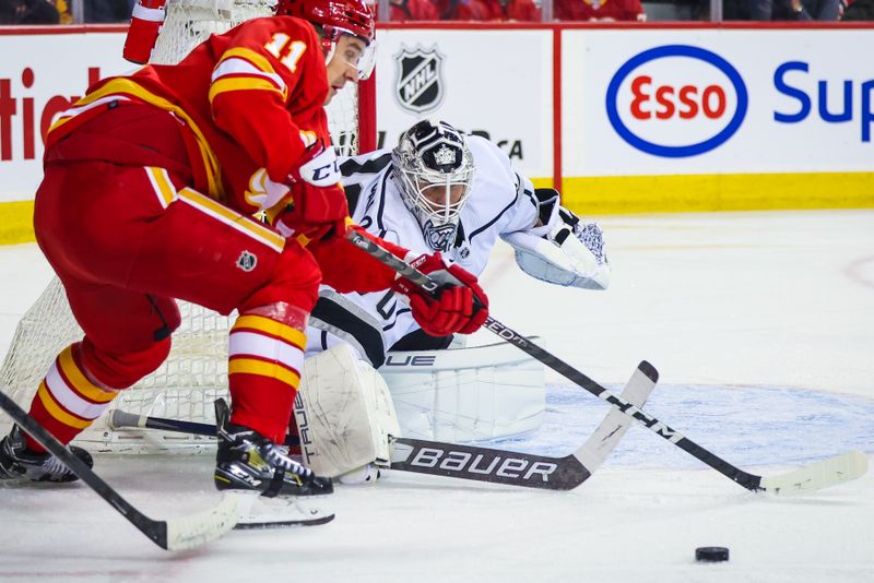 Mar 28, 2023; Calgary, Alberta, CAN; Los Angeles Kings goaltender Joonas Korpisalo (70) guards his net against the Calgary Flames during the second period at Scotiabank Saddledome. Mandatory Credit: Sergei Belski-USA TODAY Sports