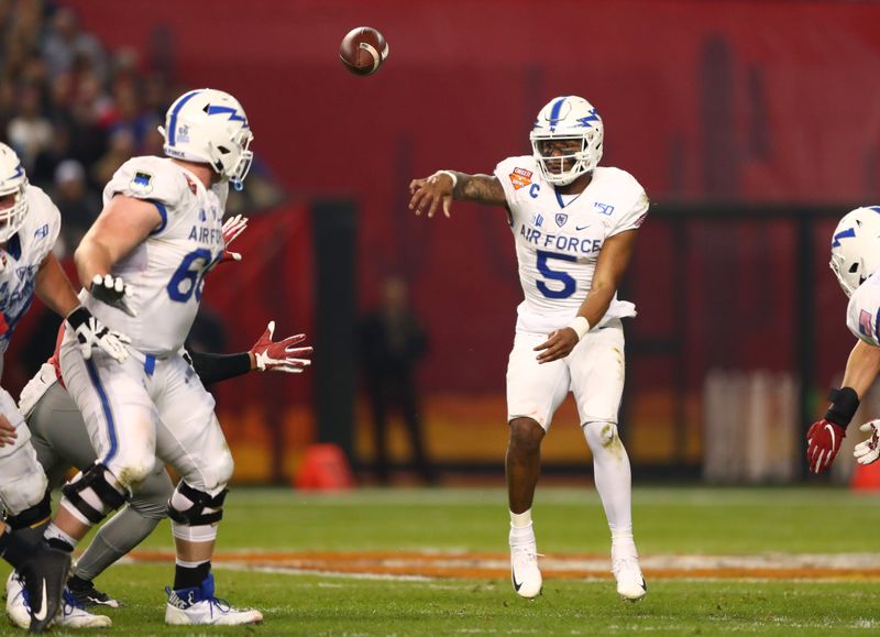 Dec 27, 2019; Phoenix, Arizona, USA; Air Force Falcons quarterback Donald Hammond III (5) against the Washington State during the first half of the Cheez-It Bowl at Chase Field. Mandatory Credit: Mark J. Rebilas-USA TODAY Sports