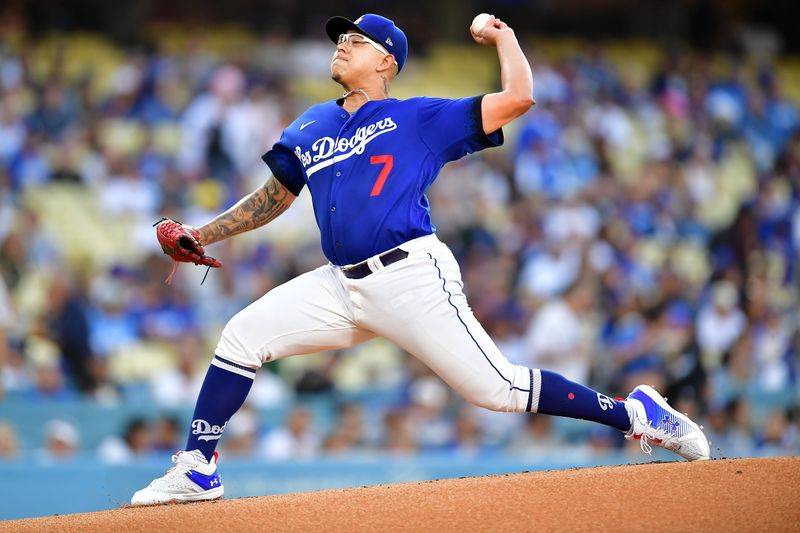 Jul 6, 2023; Los Angeles, California, USA; Los Angeles Dodgers starting pitcher Julio Urias (7) throws against the Pittsburgh Pirates during the first inning at Dodger Stadium. Mandatory Credit: Gary A. Vasquez-USA TODAY Sports