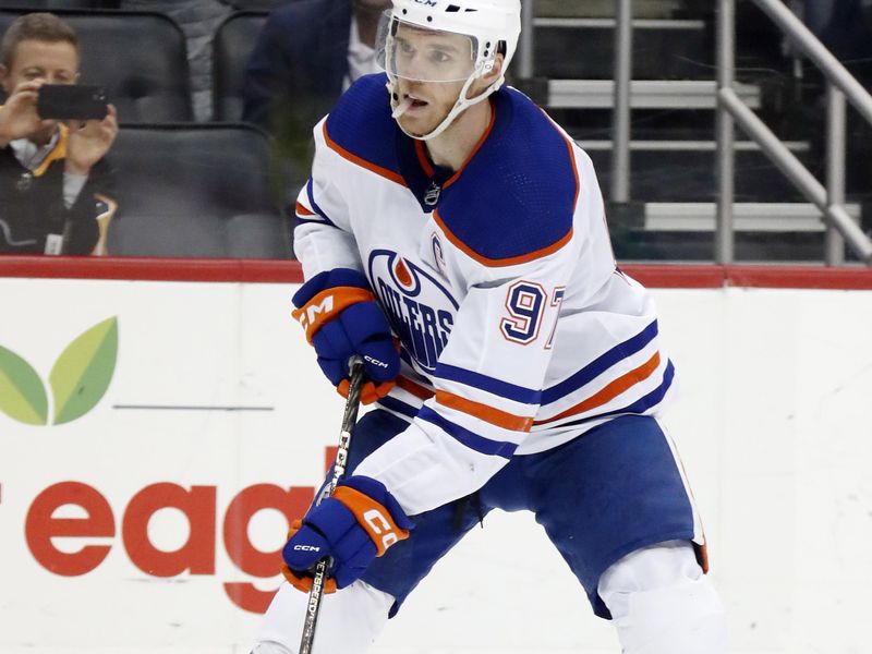 Feb 23, 2023; Pittsburgh, Pennsylvania, USA;  Edmonton Oilers center Connor McDavid (97) skates in on goal on a penalty shot against the Pittsburgh Penguins during the third period at PPG Paints Arena. Edmonton won 7-2. Mandatory Credit: Charles LeClaire-USA TODAY Sports