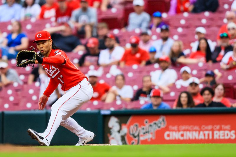 Jun 7, 2025; Cincinnati, Ohio, USA; Cincinnati Reds first baseman Connor Joe (17) tags Arizona Diamondbacks outfielder Randal Grichuk (not pictured) out at first in the ninth inning at Great American Ball Park. Mandatory Credit: Katie Stratman-Imagn Images