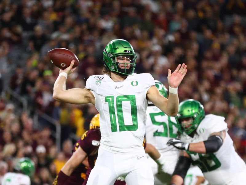 Nov 23, 2019; Tempe, AZ, USA; Oregon Ducks quarterback Justin Herbert (10) against the Arizona State Sun Devils in the first half at Sun Devil Stadium. Mandatory Credit: Mark J. Rebilas-USA TODAY Sports