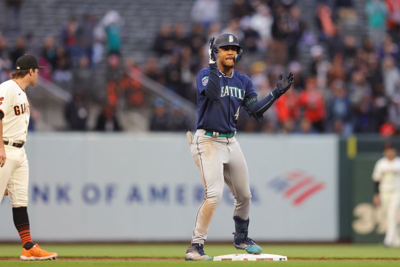 Jul 5, 2023; San Francisco, California, USA; Seattle Mariners center fielder Julio Rodriguez (44) celebrates after hitting a double during the sixth inning against the San Francisco Giants at Oracle Park. Mandatory Credit: Sergio Estrada-USA TODAY Sports