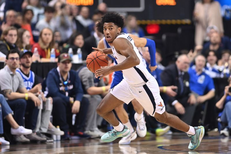 Mar 11, 2023; Greensboro, NC, USA;  Virginia Cavaliers guard Reece Beekman (2) dribbles in the second half of the Championship game of the ACC Tournament at Greensboro Coliseum. Mandatory Credit: Bob Donnan-USA TODAY Sports