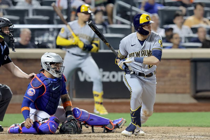 Jun 28, 2023; New York City, New York, USA; Milwaukee Brewers left fielder Christian Yelich (22) follows through on a two run single against the New York Mets during the eighth inning at Citi Field. Mandatory Credit: Brad Penner-USA TODAY Sports