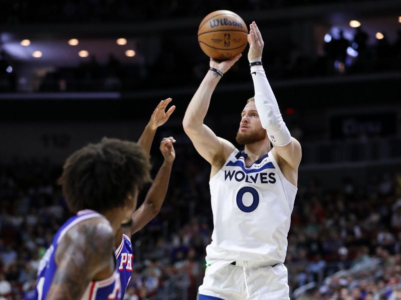 DES MOINES, IA -  OCTOBER 11: Donte DiVincenzo #0 of the Minnesota Timberwolves shoots the ball during the game against the Philadelphia 76ers during a NBA pre season game on October 11, 2024 at the Wells Fargo Arena in Des Moines, Iowa. NOTE TO USER: User expressly acknowledges and agrees that, by downloading and or using this Photograph, user is consenting to the terms and conditions of the Getty Images License Agreement. Mandatory Copyright Notice: Copyright 2024 NBAE (Photo by Jasey Bradwell/NBAE via Getty Images)