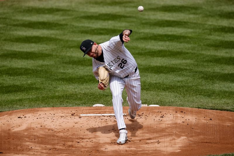 Apr 10, 2024; Denver, Colorado, USA; Colorado Rockies starting pitcher Austin Gomber (26) pitches in the first inning against the Arizona Diamondbacks at Coors Field. Mandatory Credit: Isaiah J. Downing-USA TODAY Sports