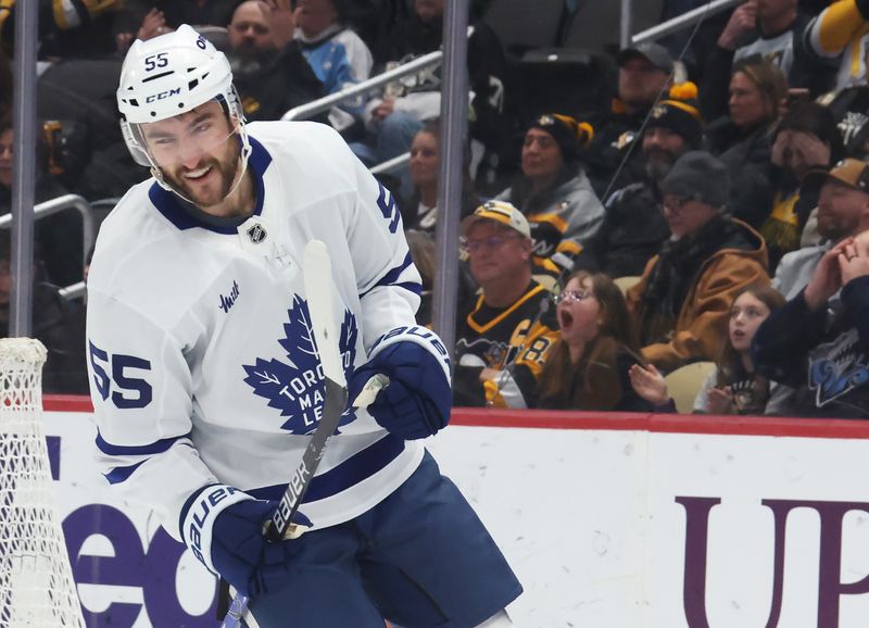 Nov 29, 2025; Pittsburgh, Pennsylvania, USA;  Toronto Maple Leafs center Nicolas Roy (55) reacts after scoring a goal against the Pittsburgh Penguins during the second period at PPG Paints Arena. Mandatory Credit: Charles LeClaire-Imagn Images