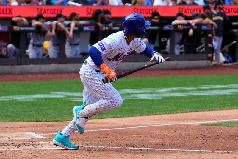 Aug 16, 2023; New York City, New York, USA; New York Mets shortstop Francisco Lindor (12) hits an RBI double against the Pittsburgh Pirates during the second inning at Citi Field. Mandatory Credit: Gregory Fisher-USA TODAY Sports