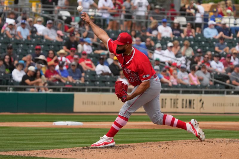 Mar 23, 2024; Mesa, Arizona, USA; Los Angeles Angels relief pitcher Luis Garcia (66) throws against the Oakland Athletics in the second inning at Hohokam Stadium. Mandatory Credit: Rick Scuteri-USA TODAY Sports