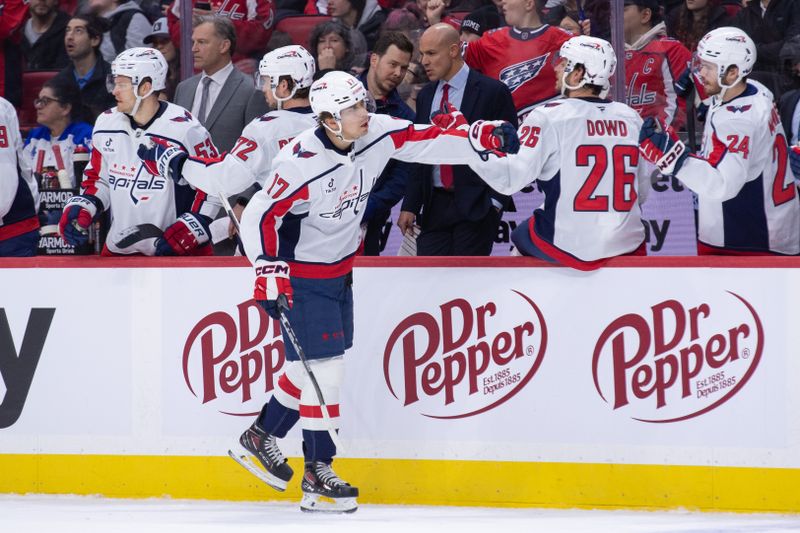 Jan 1, 2026; Ottawa, Ontario, CAN; Washington Capitals center Dylan Strome (17) celebrates with team his goal scored in the first period against the Ottawa Senators at the Canadian Tire Centre. Mandatory Credit: Marc DesRosiers-IMAGN Images
