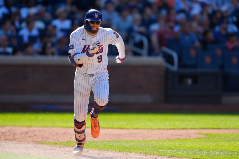 Aug 31, 2025; New York City, New York, USA; New York Mets left fielder Brandon Nimmo (9) runs out a double against the Miami Marlins during the eighth inning at Citi Field. Mandatory Credit: Gregory Fisher-Imagn Images