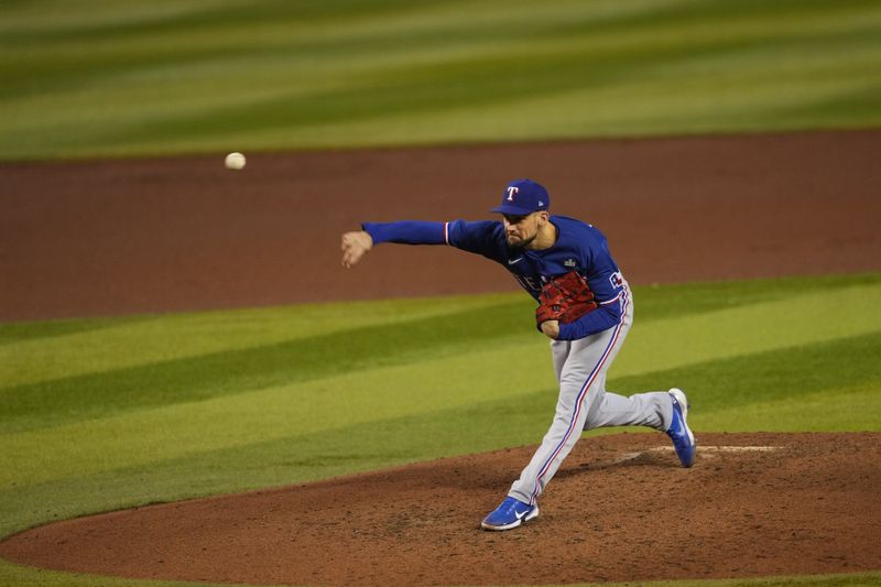 Nov 1, 2023; Phoenix, AZ, USA; Texas Rangers starting pitcher Nathan Eovaldi (17) pitches in the fifth inning against the Arizona Diamondbacks in game five of the 2023 World Series at Chase Field. Mandatory Credit: Joe Camporeale-USA TODAY Sports