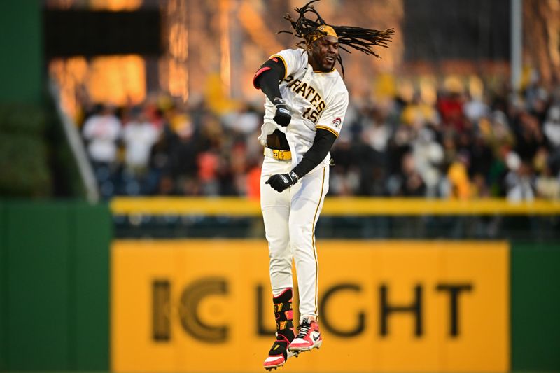 Apr 6, 2024; Pittsburgh, Pennsylvania, USA; Pittsburgh Pirates shortstop Oneil Cruz (15) celebrates after hitting a game winning walk off single during the eleventh inning against the Baltimore Orioles at PNC Park. Mandatory Credit: David Dermer-USA TODAY Sports