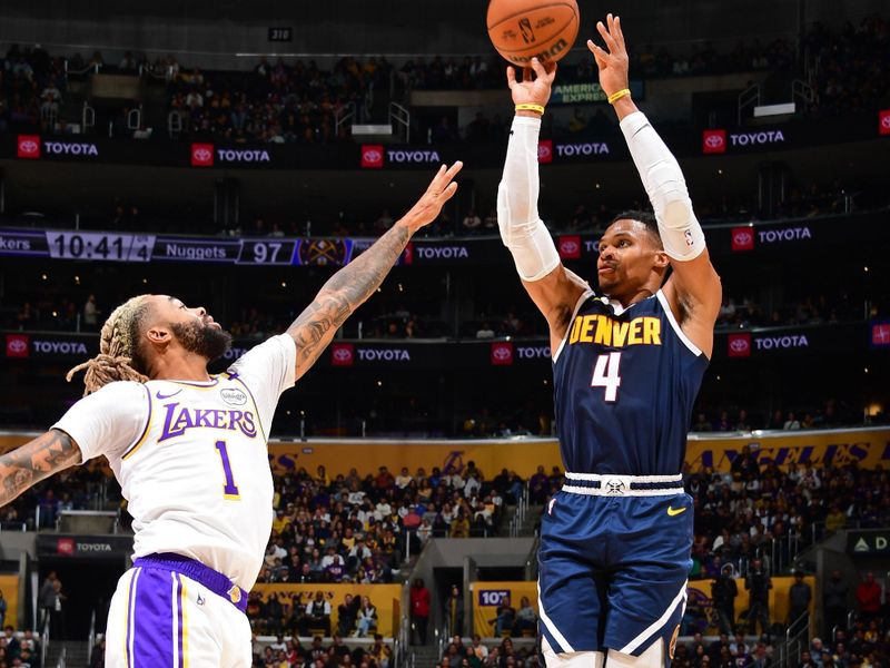 LOS ANGELES, CA - NOVEMBER 23: Russell Westbrook #4 of the Denver Nuggets shoots the ball during the game against the Los Angeles Lakers on November 23, 2024 at Crypto.Com Arena in Los Angeles, California. NOTE TO USER: User expressly acknowledges and agrees that, by downloading and/or using this Photograph, user is consenting to the terms and conditions of the Getty Images License Agreement. Mandatory Copyright Notice: Copyright 2024 NBAE (Photo by Adam Pantozzi/NBAE via Getty Images)