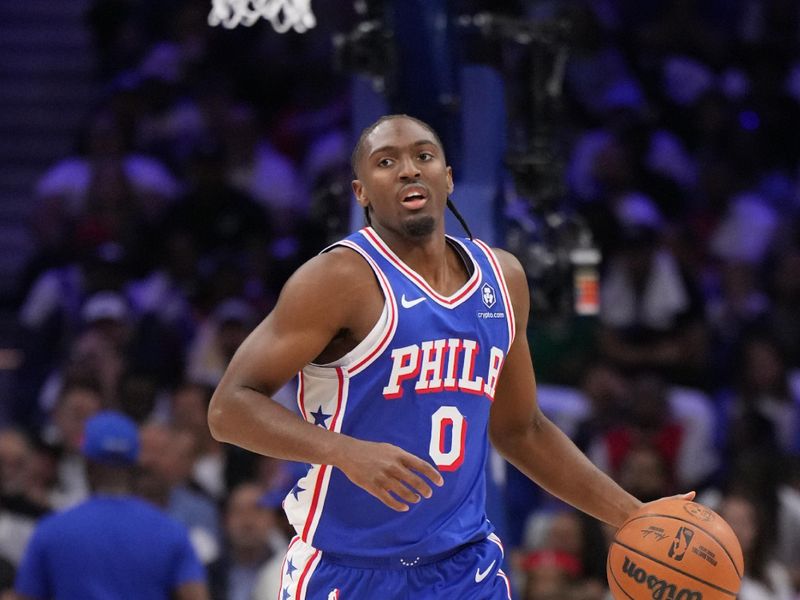 PHILADELPHIA, PA - OCTOBER 23: Tyrese Maxey #0 of the Philadelphia 76ers dribbles the ball during the game against the Milwaukee Bucks on October 23, 2024 at the Wells Fargo Center in Philadelphia, Pennsylvania NOTE TO USER: User expressly acknowledges and agrees that, by downloading and/or using this Photograph, user is consenting to the terms and conditions of the Getty Images License Agreement. Mandatory Copyright Notice: Copyright 2024 NBAE (Photo by Jesse D. Garrabrant/NBAE via Getty Images)