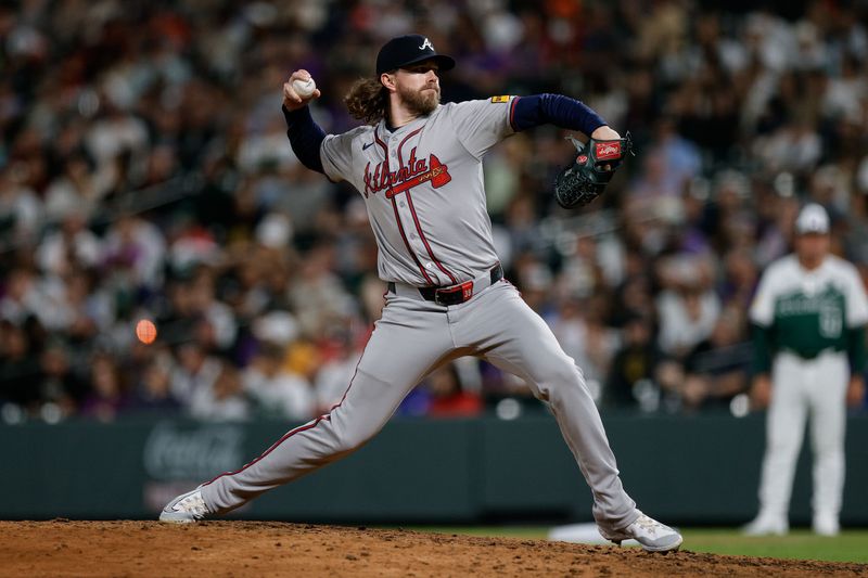 Aug 10, 2024; Denver, Colorado, USA; Atlanta Braves relief pitcher Pierce Johnson (38) pitches in the seventh inning against the Colorado Rockies at Coors Field. Mandatory Credit: Isaiah J. Downing-USA TODAY Sports