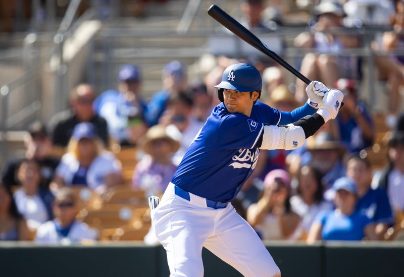 Mar 3, 2024; Phoenix, Arizona, USA; Los Angeles Dodgers designated hitter Shohei Ohtani against the Colorado Rockies during a spring training game at Camelback Ranch-Glendale. Mandatory Credit: Mark J. Rebilas-USA TODAY Sports