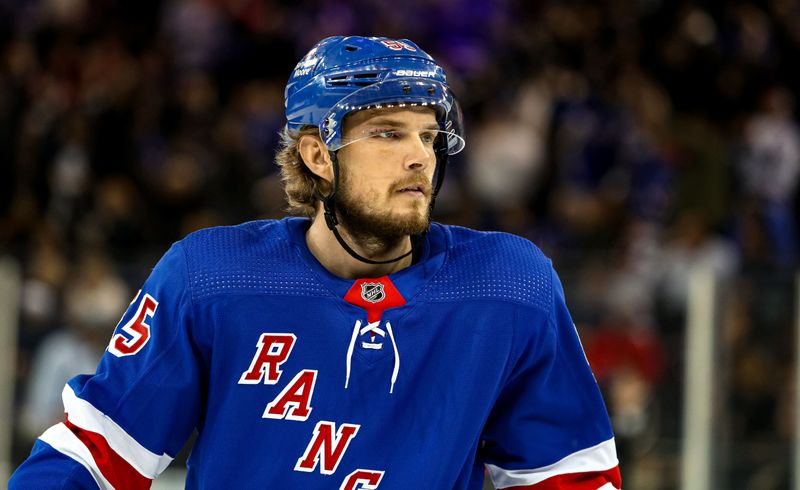 Jan 2, 2024; New York, New York, USA; New York Rangers defenseman Ryan Lindgren (55) skates against the Carolina Hurricanes during the first period at Madison Square Garden. Mandatory Credit: Danny Wild-USA TODAY Sports