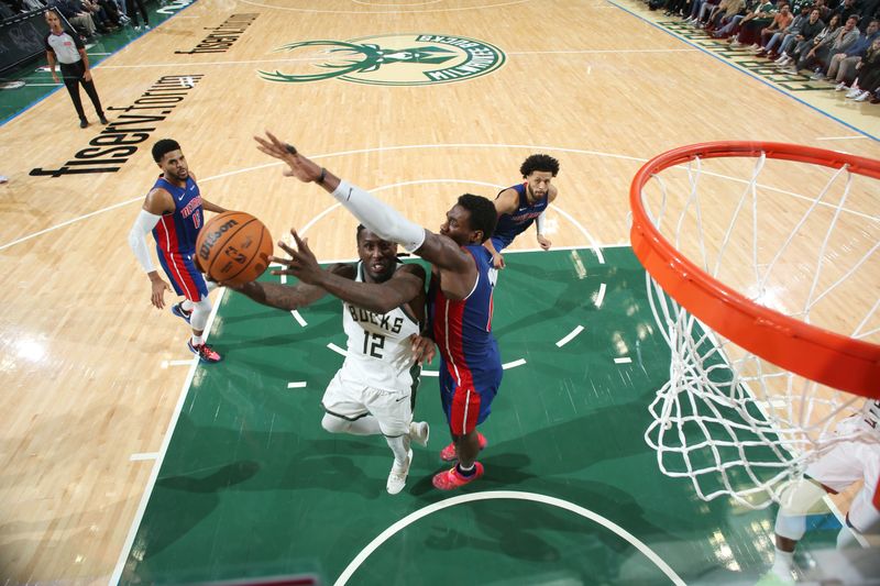 MILWAUKEE, WI - NOVEMBER 13: Taurean Prince #12 of the Milwaukee Bucks drives to the basket during the game against the Detroit Pistons on November 13, 2024 at the Fiserv Forum Center in Milwaukee, Wisconsin. NOTE TO USER: User expressly acknowledges and agrees that, by downloading and or using this Photograph, user is consenting to the terms and conditions of the Getty Images License Agreement. Mandatory Copyright Notice: Copyright 2024 NBAE (Photo by Gary Dineen/NBAE via Getty Images).