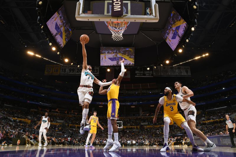 LOS ANGELES, CA - NOVEMBER 13: Scotty Pippen Jr. #1 of the Memphis Grizzlies drives to the basket during the game against the Los Angeles Lakers on November 13, 2024 at Crypto.Com Arena in Los Angeles, California. NOTE TO USER: User expressly acknowledges and agrees that, by downloading and/or using this Photograph, user is consenting to the terms and conditions of the Getty Images License Agreement. Mandatory Copyright Notice: Copyright 2024 NBAE (Photo by Adam Pantozzi/NBAE via Getty Images)