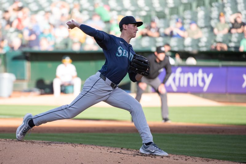 Jun 4, 2024; Oakland, California, USA; Seattle Mariners pitcher George Kirby (68) throws a pitch during the first inning against the Oakland Athletics at Oakland-Alameda County Coliseum. Mandatory Credit: Ed Szczepanski-USA TODAY Sports