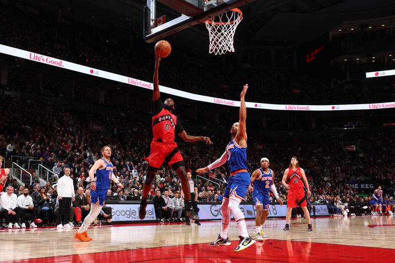 TORONTO, CANADA - MARCH 27: Javon Freeman-Liberty #0 of the Toronto Raptors drives to the basket during the game against the New York Knicks on March 27, 2024 at the Scotiabank Arena in Toronto, Ontario, Canada.  NOTE TO USER: User expressly acknowledges and agrees that, by downloading and or using this Photograph, user is consenting to the terms and conditions of the Getty Images License Agreement.  Mandatory Copyright Notice: Copyright 2024 NBAE (Photo by Vaughn Ridley/NBAE via Getty Images)