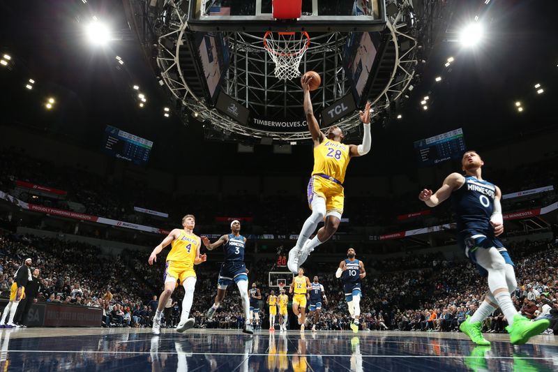 MINNEAPOLIS, MN -  DECEMBER 13:  Rui Hachimura #28 of the Los Angeles Lakers shoots the ball during the game against the Minnesota Timberwolves on December 13, 2024 at Target Center in Minneapolis, Minnesota. NOTE TO USER: User expressly acknowledges and agrees that, by downloading and or using this Photograph, user is consenting to the terms and conditions of the Getty Images License Agreement. Mandatory Copyright Notice: Copyright 2024 NBAE (Photo by David Sherman/NBAE via Getty Images)