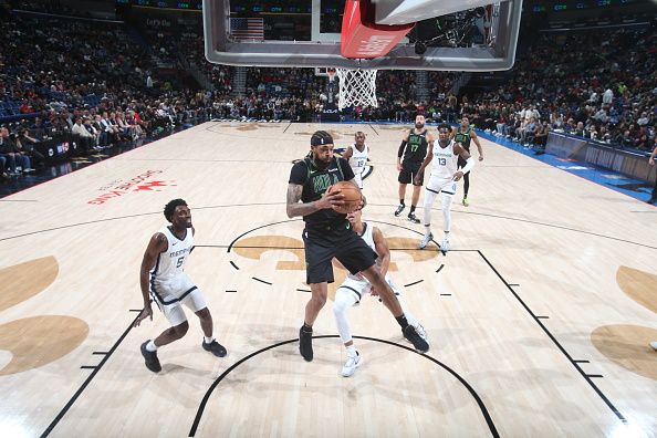 NEW ORLEANS, LA - DECEMBER 19: Brandon Ingram #14 of the New Orleans Pelicans grabs a rebound during the game against the Memphis Grizzlies on December 19, 2023 at the Smoothie King Center in New Orleans, Louisiana. NOTE TO USER: User expressly acknowledges and agrees that, by downloading and or using this Photograph, user is consenting to the terms and conditions of the Getty Images License Agreement. Mandatory Copyright Notice: Copyright 2023 NBAE (Photo by Layne Murdoch Jr./NBAE via Getty Images)