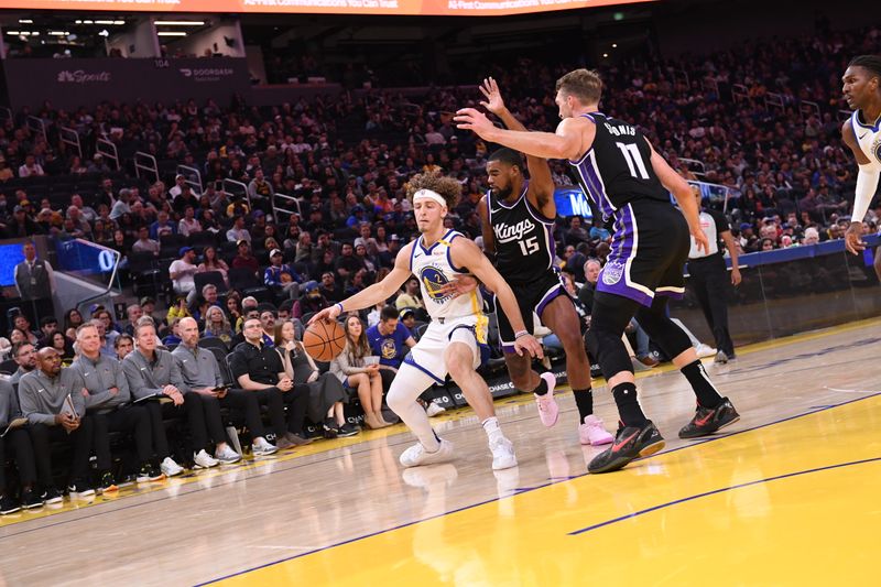 SAN FRANCISCO, CA - OCTOBER 11: Brandin Podziemski #2 of the Golden State Warriors handles the ball during the game against the Sacramento Kings during a NBA Preseason game on October 11, 2024 at Chase Center in San Francisco, California. NOTE TO USER: User expressly acknowledges and agrees that, by downloading and or using this photograph, user is consenting to the terms and conditions of Getty Images License Agreement. Mandatory Copyright Notice: Copyright 2024 NBAE (Photo by Noah Graham/NBAE via Getty Images)