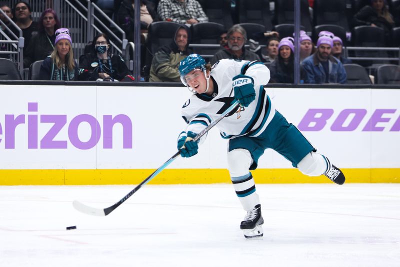 Nov 15, 2025; Seattle, Washington, USA; San Jose Sharks center Will Smith (2) shoots the puck in the second period against the Seattle Kraken at Climate Pledge Arena. Mandatory Credit: Kevin Ng-Imagn Images