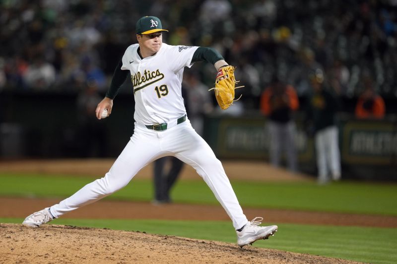 Sep 6, 2024; Oakland, California, USA; Oakland Athletics relief pitcher Mason Miller (19) throws a pitch against the Detroit Tigers during the ninth inning at Oakland-Alameda County Coliseum. Mandatory Credit: Darren Yamashita-Imagn Images