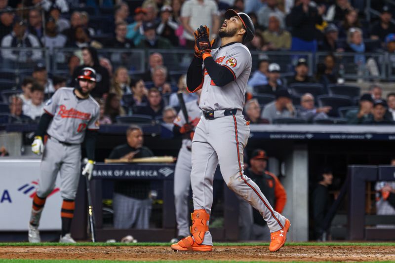 Sep 24, 2024; Bronx, New York, USA; Baltimore Orioles right fielder Anthony Santander (25) celebrates after hitting a solo home run during the sixth inning against the New York Yankees at Yankee Stadium. Mandatory Credit: Vincent Carchietta-Imagn Images